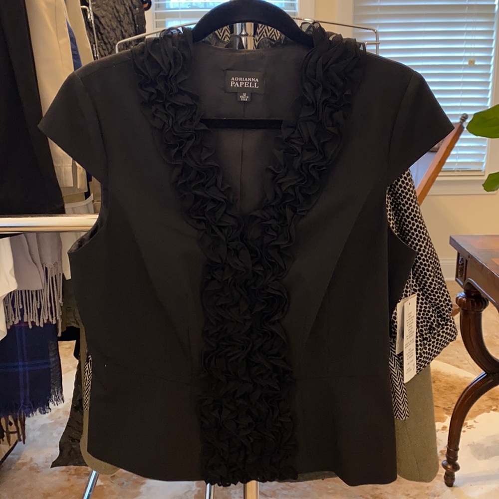 Black ruffle front vest with cap shoulders